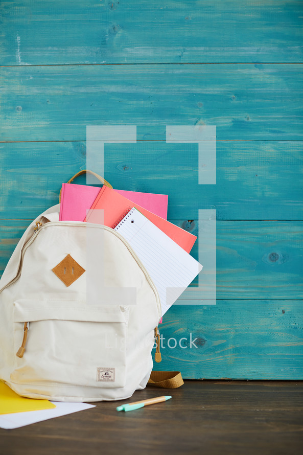 book bag with school supplies 