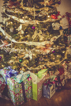 Presents under a Christmas tree. 