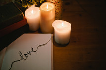 The word love and candles