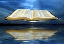 Open Bible floating above water.