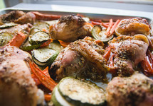 baked chicken and vegetables in a pan