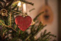 heart shaped ornament on a Christmas tree 