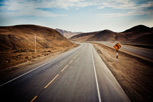 road through desert mountains 