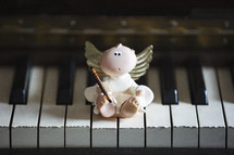angel on a piano 
