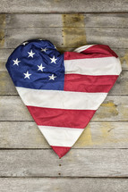 American flag folded into a heart shape 