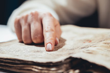 Woman reading ancient book - Bible. 
