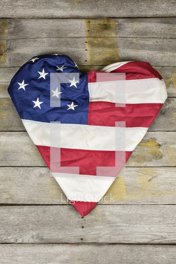 American flag folded into a heart shape 