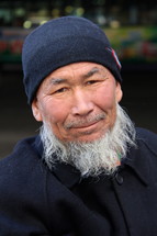Muslim man with a white beard 
