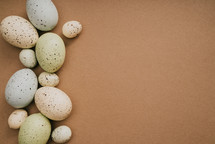 Easter eggs on a brown background 