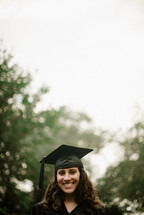 face of a smiling female graduate 