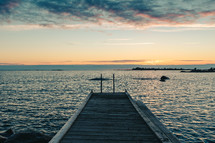 a dock at sunset 