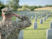 soldier saluting Arlington National Cemetery 