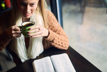 woman drinking coffee and an open Bible 