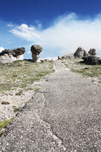 paved path and rock formations 