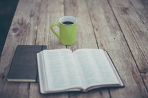 coffee mug and open Bible