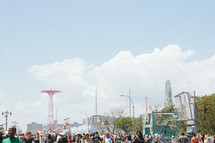 Crowd at an amusement park.