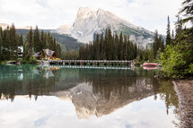 lake, lodge, and mountain peak 