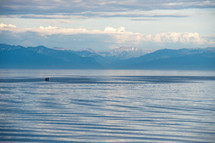 Two people in a boat on Baikal lake.