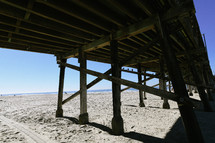 sand under a pier 