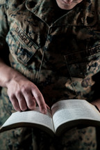 marine reading a Bible 