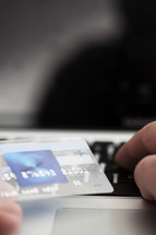 person entering credit card information online. 