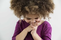 little girl child in prayer.