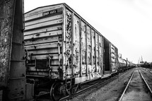 Box cars on a railroad track.