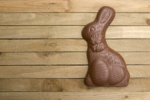 chocolate bunny on a wood background 