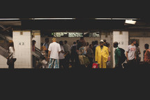 people waiting in a subway 