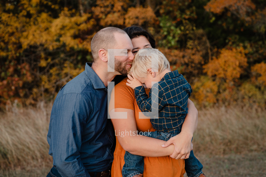family portrait outdoors in autumn 