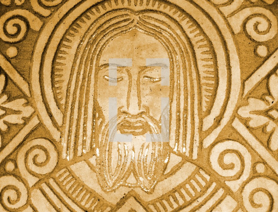 A stone carving relief of Jesus Christ from a Mayan art carving. 