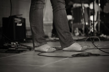 feet on a woman on stage 