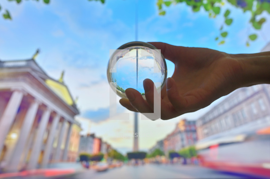 Glass Lens ball and famous landmark Spire in Dublin, Ireland