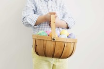 boy holding an Easter basket 