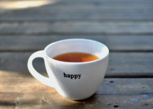 coffee cup with the word happy 