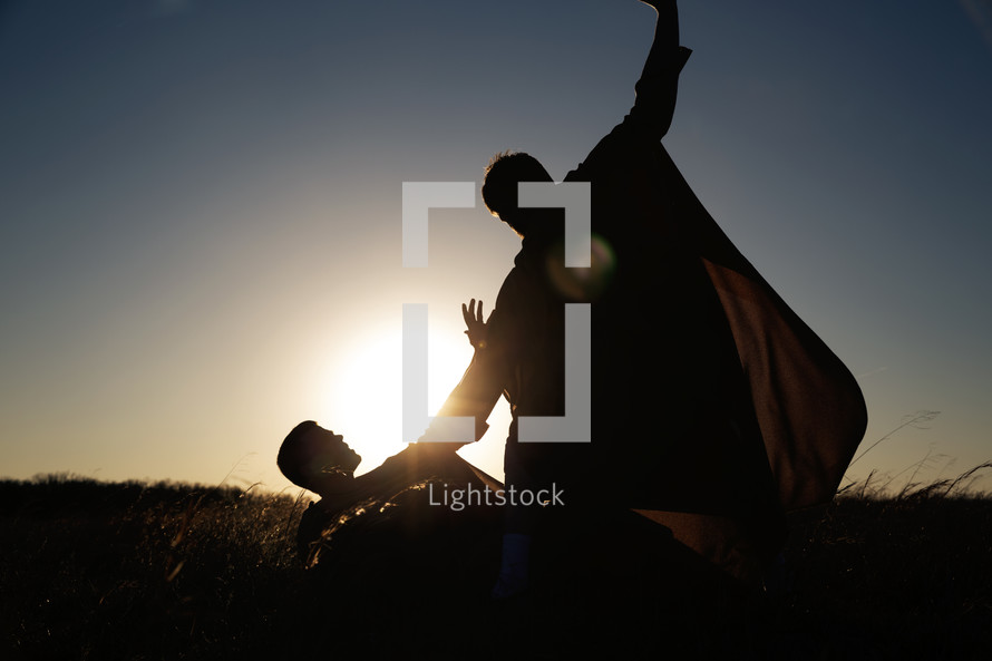 silhouettes of Cain and Abel fighting.