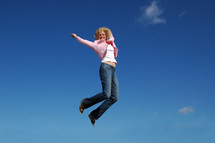 woman leaping in the air 