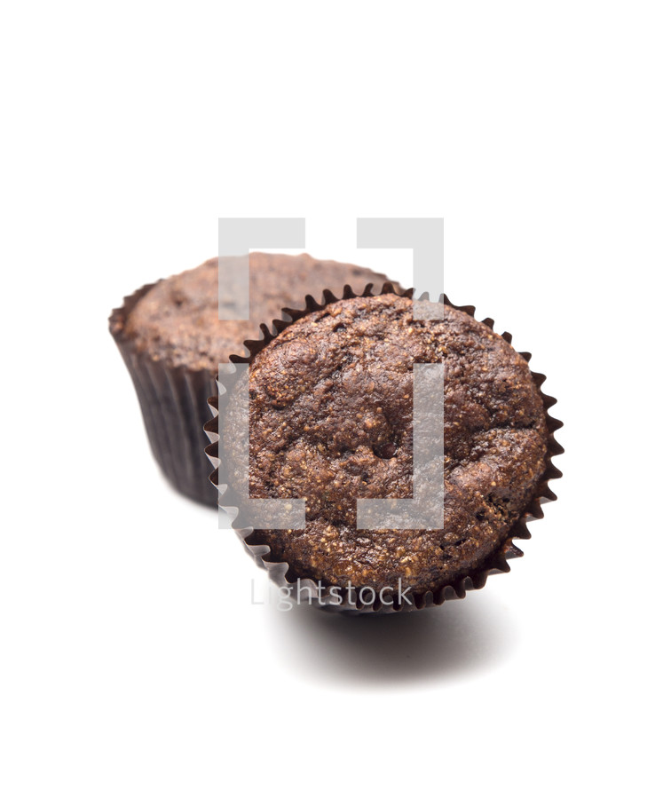 Whole Wheat Double Chocolate Chip Muffins Isolated on a White Background