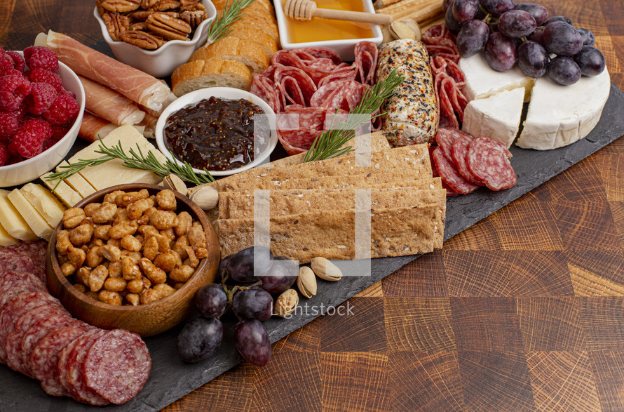 Charcuterie board with snacking food