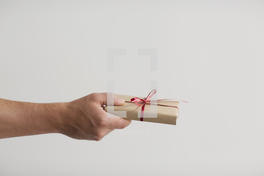 man giving a gift.