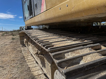 Close up of a large excavator at a construction site