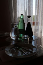 pitcher of water by a bedside 