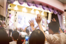 raised hands during a worship service 