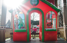 toddler looking at an outdoor Christmas display 