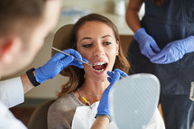 A woman getting a dental exam