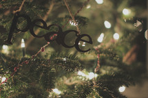 A peace ornament on the Christmas tree