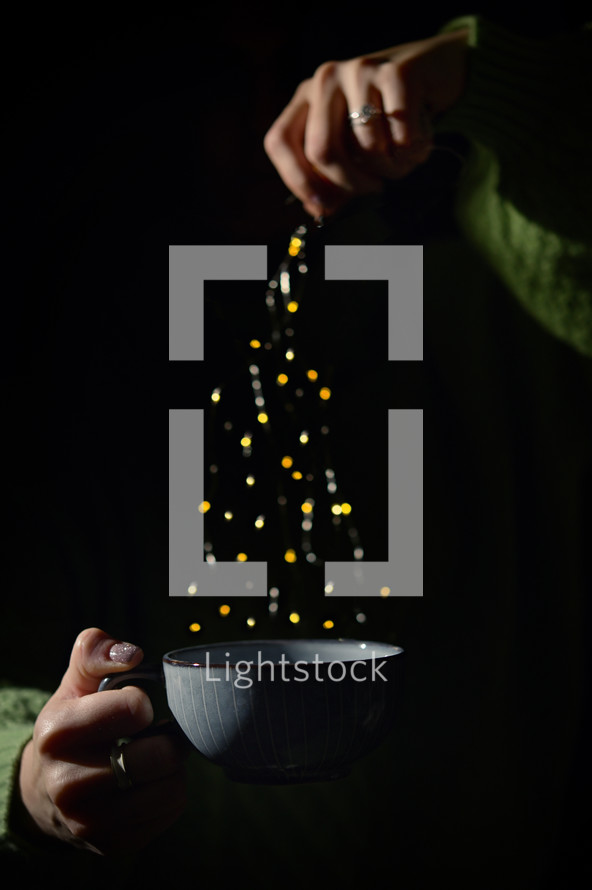 Conceptual Christmas Tree from Led Lights and Cup of Tea
