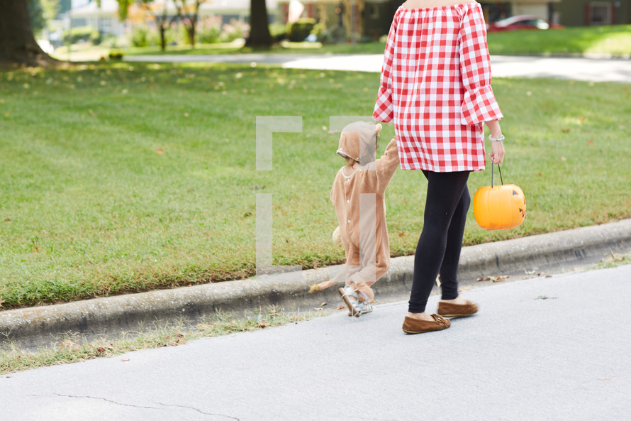 mother and child trick-or-treating 