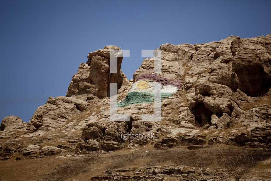 Iraqi flag painted on a cliff wall 