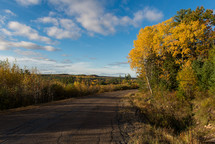 rural paved road in fall 